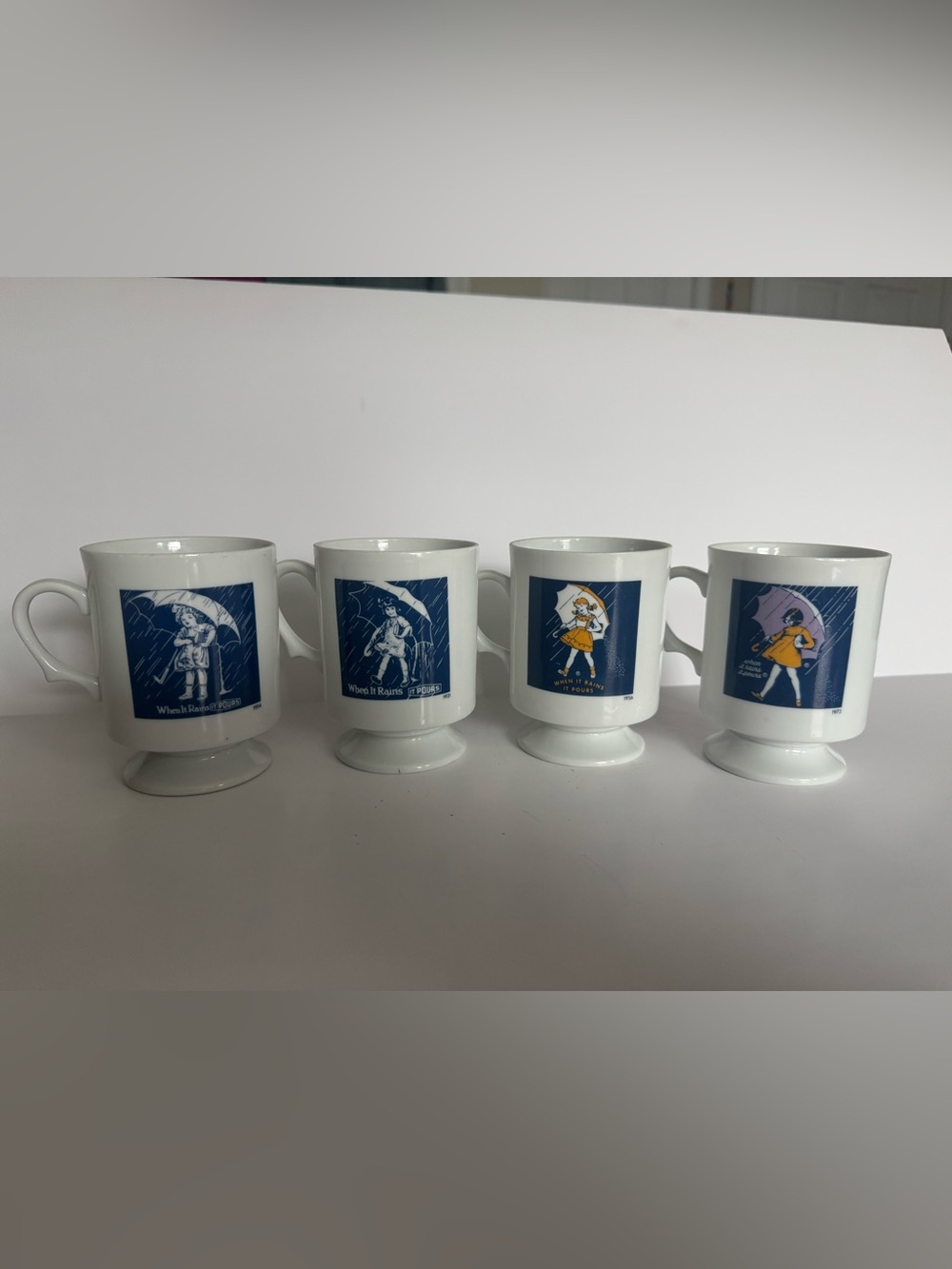 Morton Salt Umbrella Girl Pedestal Coffee Mugs Set of 4 Vintage Logo Designs